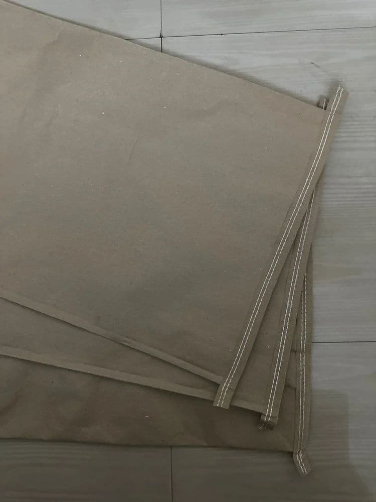 Close-up of layered industrial paper bag construction
